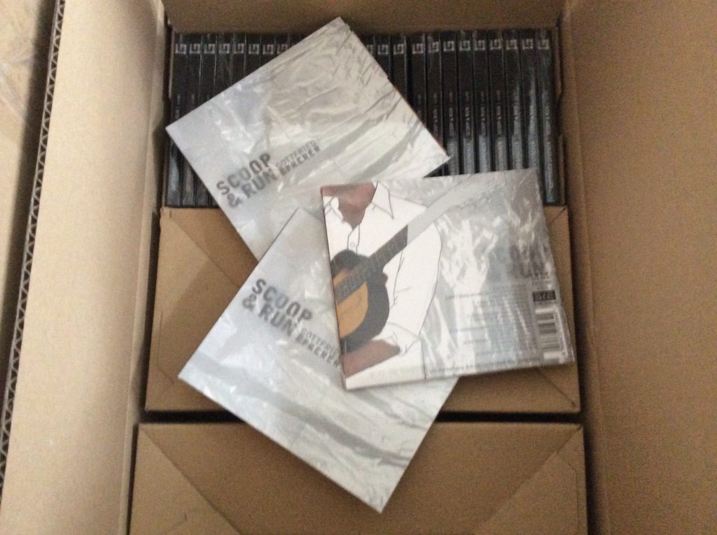 Schachtel mit Cds Scoop & Run